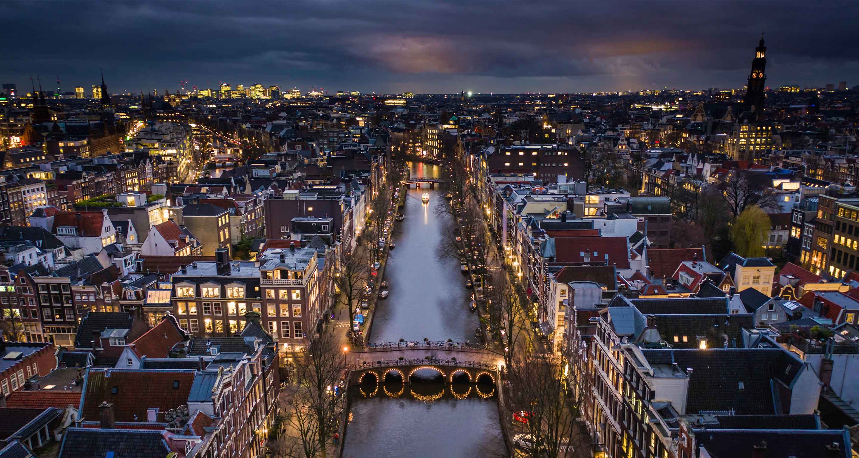 Aerial view of Amsterdam canals by evening light.